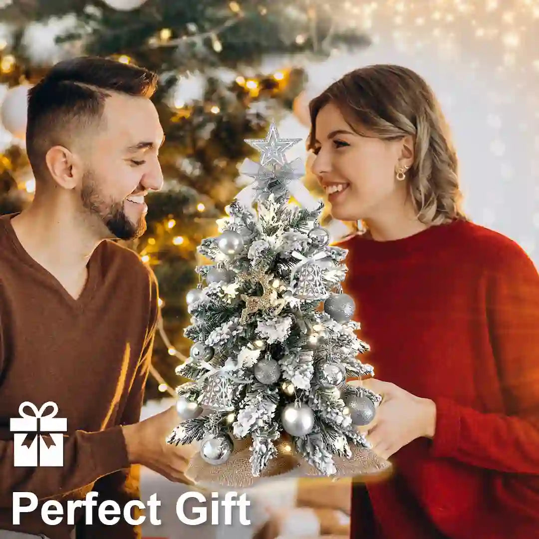 Tabletop mini Christmas tree in home office or apartment setting