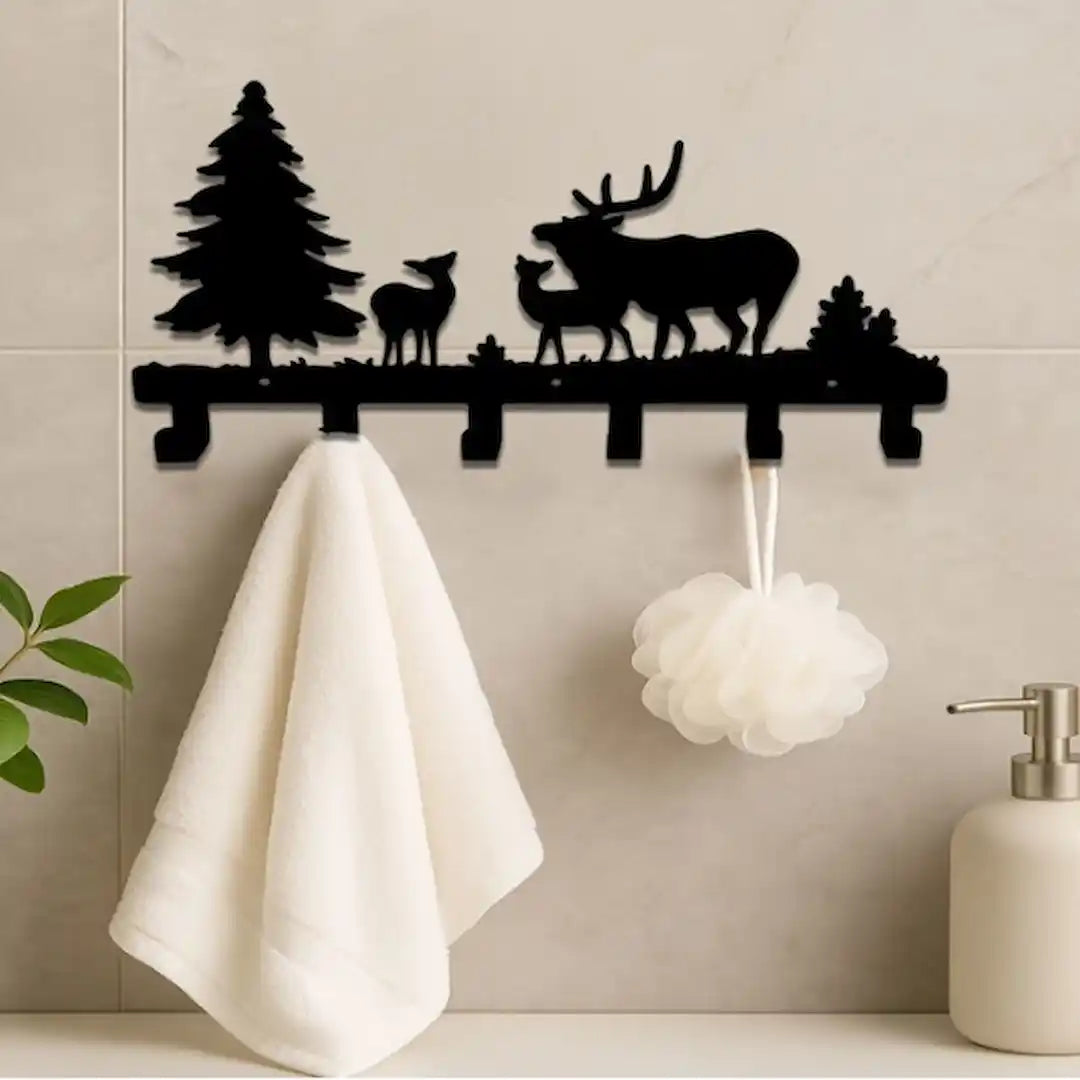 Metal tree branch wall hook with animal-shaped hooks detail