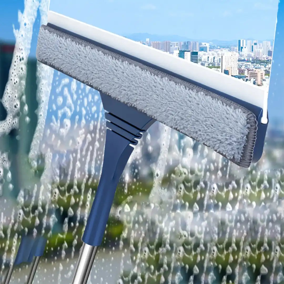 Simplix window scraper cleaning glass window with water streaks