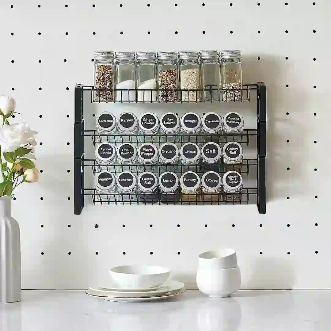 Spice rack organizer filled with spice jars on kitchen counter