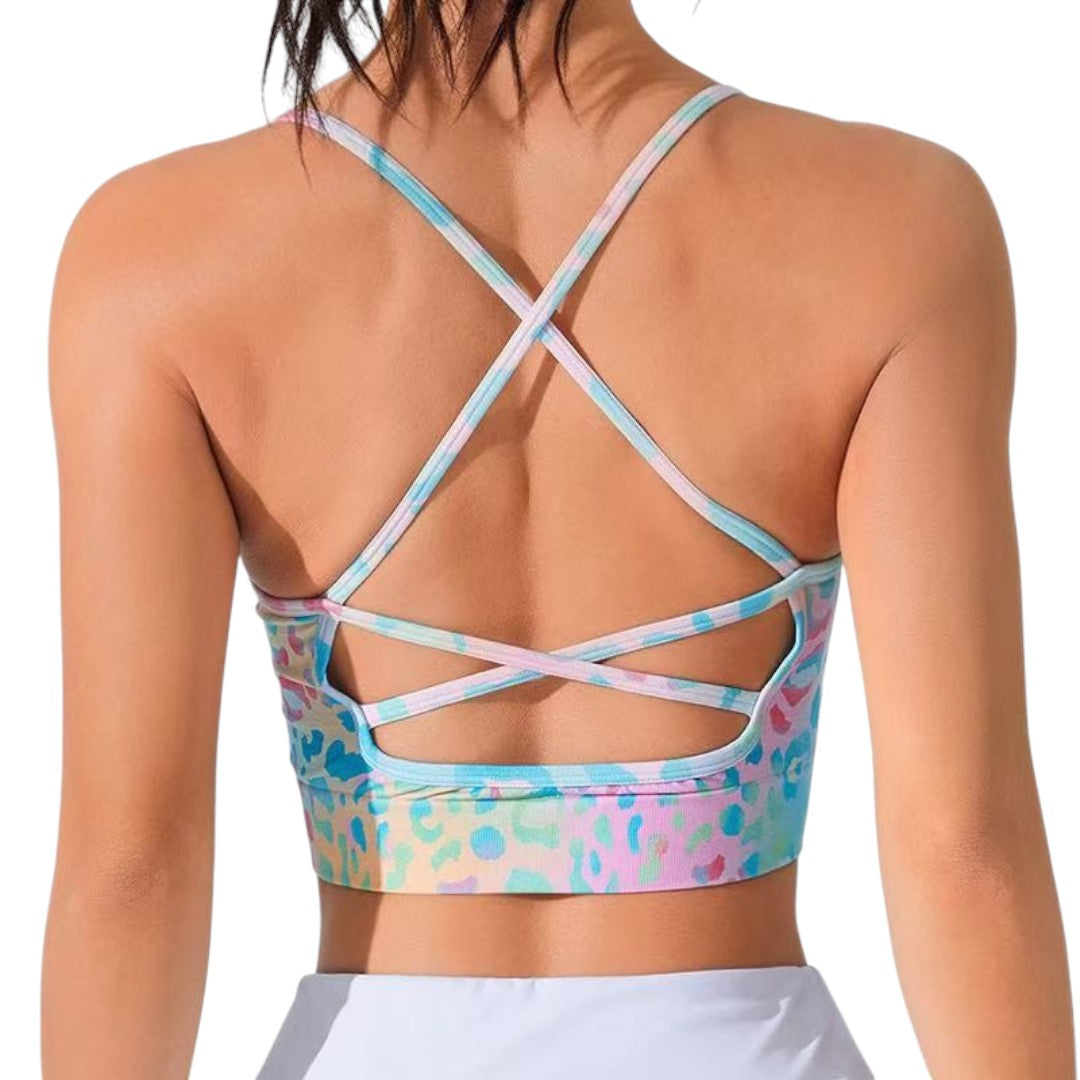 Simplix women's pastel floral print sports bra with crisscross thin straps, ideal for summer workouts and daily wear.